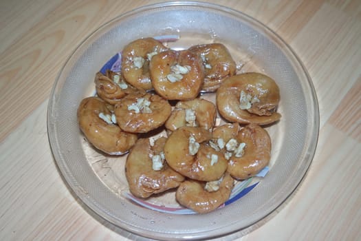 Closeup of delicious and tasty Asian sweet dish called balu shahi or baloshahi or balushahi. This dish is street sweet found in Pakistan India and Bangladesh and served in the festivities.
