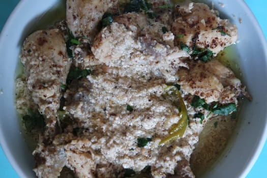 Homemade chicken qorma or white qorma dish. Traditional dish for parties and ceremonial purpose popular in South Asian countries like Pakistan, India and Bangladesh