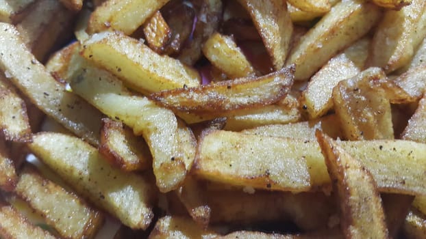 Potato fried or roasted slices on clean background with copy space for text