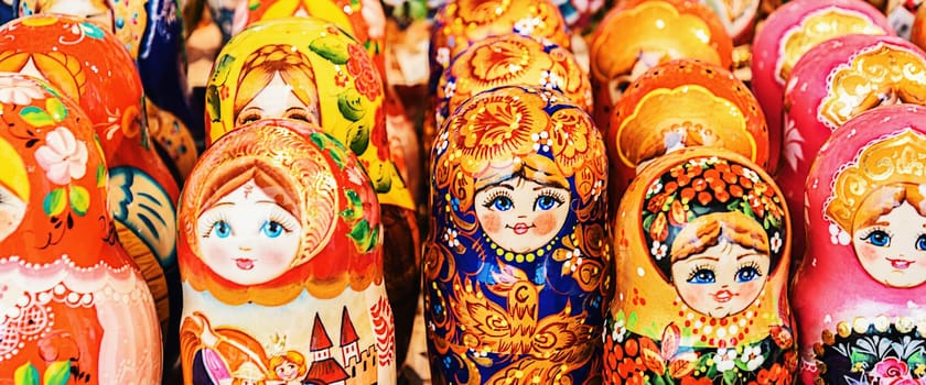 Colorful Russian Nesting Dolls Matreshka At The Market. Matrioshka Babushka Nesting Dolls Are The Most Popular Souvenirs From Russia