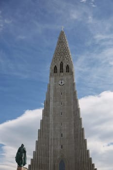 Reykjavik, Iceland - July 29, 2017: Hallgrimskirkja Cathedral in Reykjavik, Iceland, lutheran parish church, exterior in a sunny summer day with a blue cloudy sky.