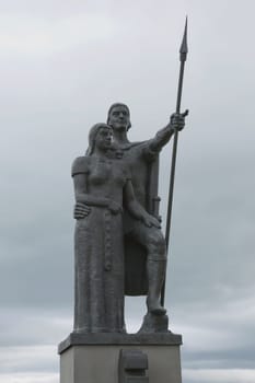 Statue of Helgi the Lean (Helgi Magri Eyvindarson), and his wife Thorunn Hyrna. Brekkugata, Akureyri, northern Iceland, North Atlantic, Europe.