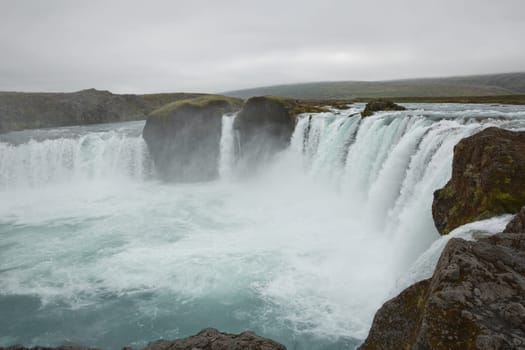 The Godafoss (waterfall of the gods) is a famous waterfall in Iceland. The breathtaking landscape of Godafoss waterfall attracts tourist to visit the Northeastern Region of Iceland.