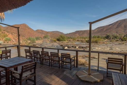 Wooden terrace with a view of the Kunene River, Namibia