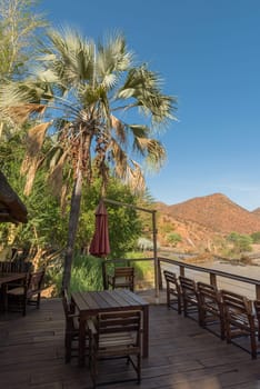 Wooden terrace with a view of the Kunene River, Namibia