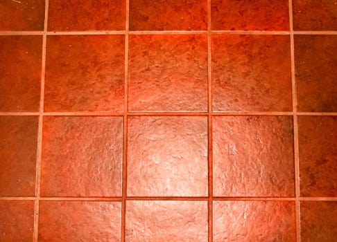 The background is the texture of the tile. The pattern and texture of the tile is construction.