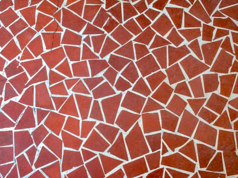 The background is the texture of the tile. The pattern and texture of the tile is construction.