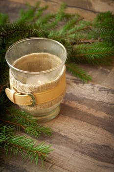 Christmas candlestick with spruce fir branch. Place for text. Vertical image