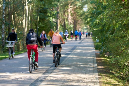 Bicyclists on the dune road between Ahlbeck in Germany and Swinoujscie in Poland