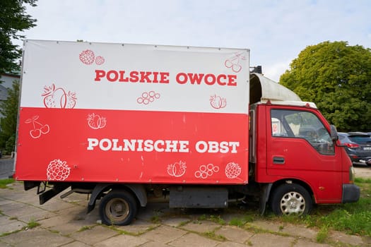 Truck with the inscription Polish fruit in Polish and German language