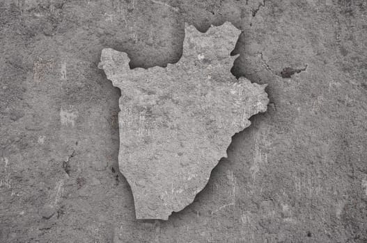 Map of Burundi on weathered concrete