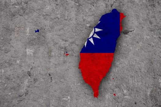 Map and flag of Taiwan on weathered concrete
