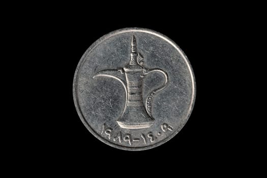 United Arab Emirates 1 Dirham coin showing a traditional Arabic Dallah coffee pot cut out and isolated on a black background, stock photo image