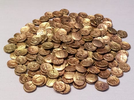 Iron Age gold stater coins from the Alton Hoard of Tincomarus of the Belgic ancient Briton Atrebates tribe found in the South of England UK, stock photo image