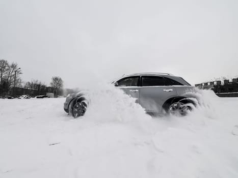 Moscow, Russia - January 24, 2019: Car infiniti QX70, winter photos of the car when driving through snowdrifts.