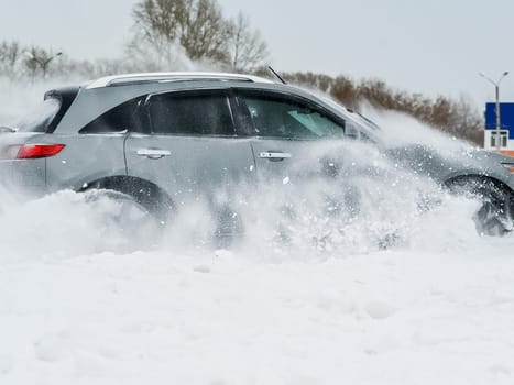 Moscow, Russia - January 24, 2019: Car infiniti QX70, winter photos of the car when driving through snowdrifts.