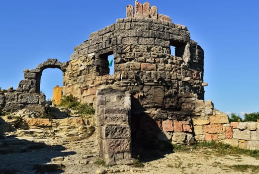 The ruins of an old fortress. Antique buildings.