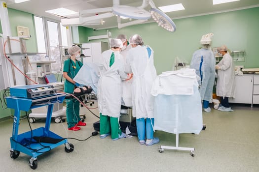 Moscow, Russia - June 14, 2019: Medical staff in the operating room. Doctors' work.