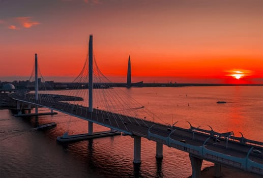A bridge across the river. A large bridge in St. Petersburg.