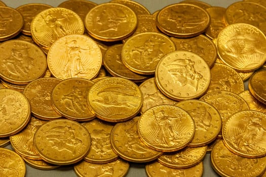 American gold coin treasure hoard of the rare USA double eagle 20 dollar bullion currency coinage used in the late 19th century as America money, stock photo image