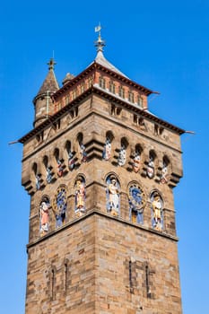 The clock tower of Cardiff Castle Wales UK completed in 1873 which is part of the wall of the 12th century Norman fort which is a popular tourism travel destination attraction landmark of the city