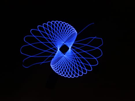 Light abstract forms symmetrical round different colors