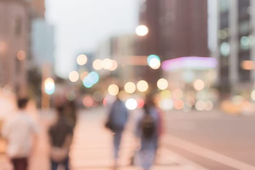 Abstract urban background with blurred buildings and street, shallow depth of focus.