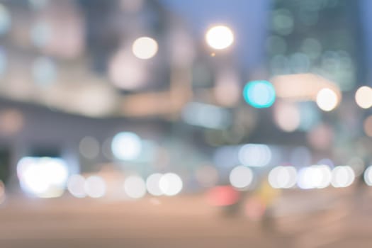 Abstract urban background with blurred buildings and street, shallow depth of focus.