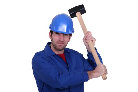 craftsman holding a hammer