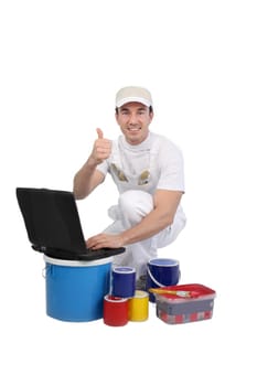 Painter with a laptop