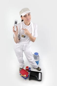 Painter pointing to her mobile phone