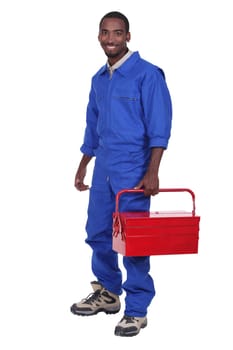Manual worker with a red toolbox