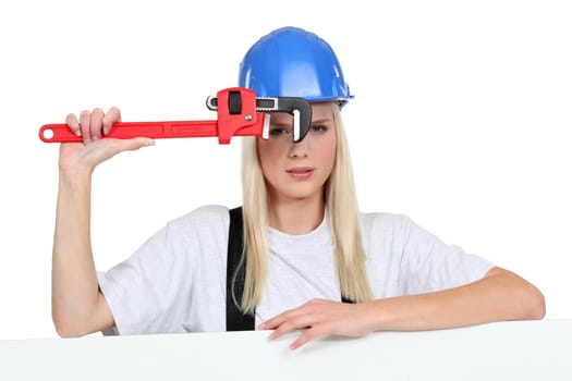 Craftswoman with wrench