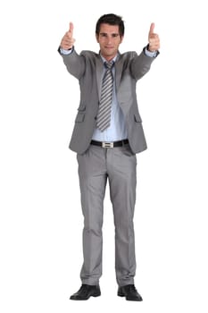 Businessman shooting with fingers