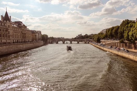 Paris, Notre Dame  with boat on Seine, France