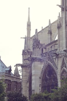 Architectural details of Cathedral Notre Dame de Paris. Cathedral Notre Dame de Paris - most famous Gothic, Roman Catholic cathedral on the eastern half of the Cite Island. France, Europe.