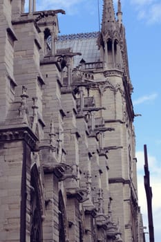 Architectural details of Cathedral Notre Dame de Paris. Cathedral Notre Dame de Paris - most famous Gothic, Roman Catholic cathedral on the eastern half of the Cite Island. France, Europe.