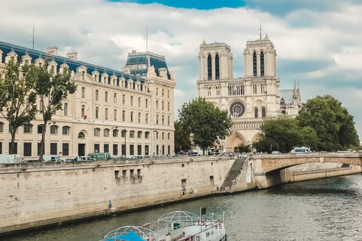 Paris, Notre Dame  with boat on Seine, France