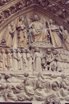 Architectural details of Cathedral Notre Dame de Paris. Cathedral Notre Dame de Paris - most famous Gothic, Roman Catholic cathedral on the eastern half of the Cite Island. France, Europe.