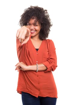 Young beautiful african woman pointing at you, isolated over white