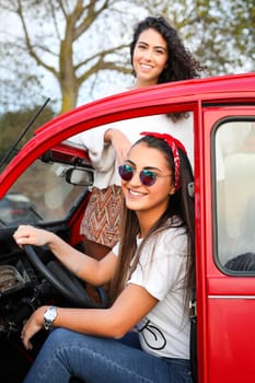 Two friends going on a roadtrip through countryside