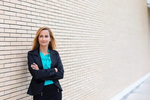 A young and professional business woman outdoors