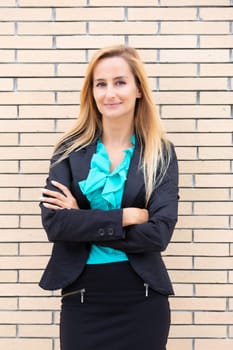 A young and professional business woman outdoors