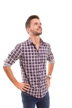 Studio picture of a young and handsome man posing isolated