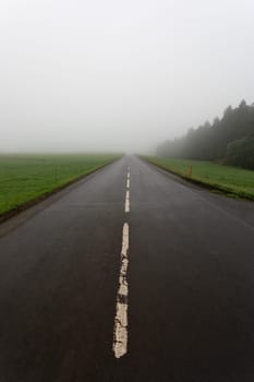 A road leading to Seven Cities (Sete Cidades) on a foggy day, Sao Miguel, Azores, Portugal