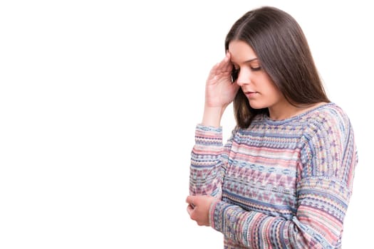 Young woman with a strong headache, isolated over white background