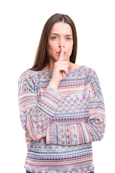 Beautiful young woman asking for silence isolated