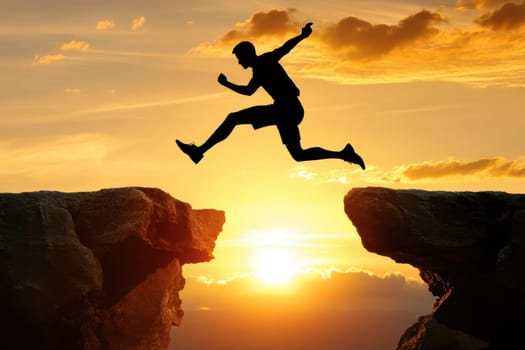 A dramatic silhouette of an athlete leaping across a canyon at sunset. This powerful image captures the essence of adventure, determination, and the thrill of overcoming challenges in nature.
