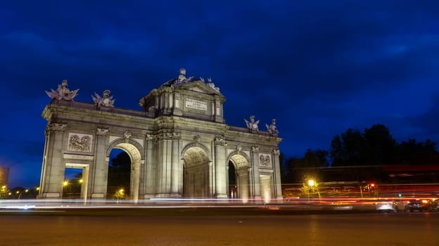 Puerta de Alcala (Alcala Gate) during night in Madrid, Spain