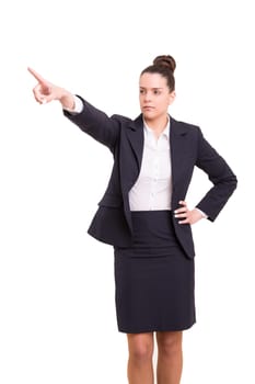 A beautiful business woman pointing to something, isolated over a copy space background